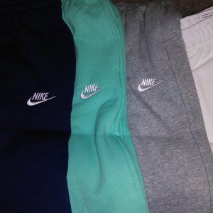 Nike sweats, sweater, and shoes. All brand new with tags
